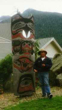 totem pole and native man
