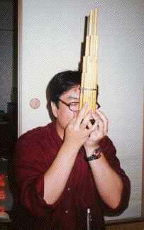 Nakata-san blowing on the sho